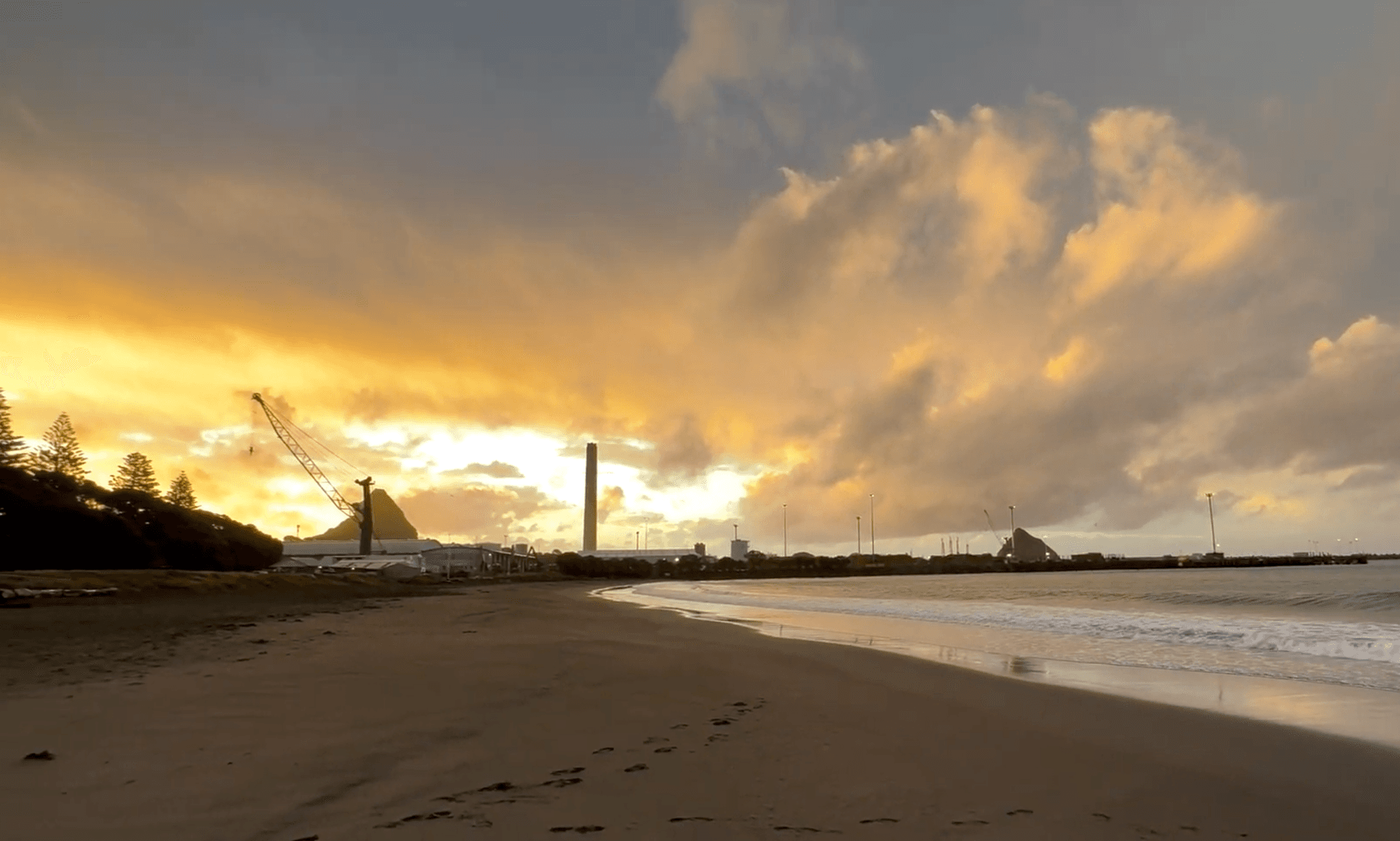 Sunset at Ngāmotu Beach and Breakwater Bay