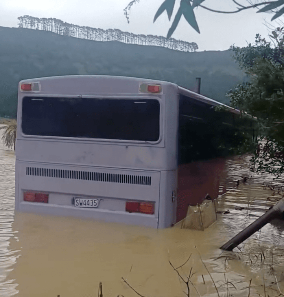 Watch: Awakino Gorge Hit by Extensive Flooding and Slips, State Highways Closed